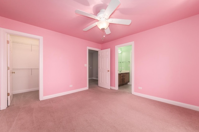 6433 Davidson Ct, Gurnee, IL 60031 - unfurnished bedroom with carpet, baseboards, and a walk in closet