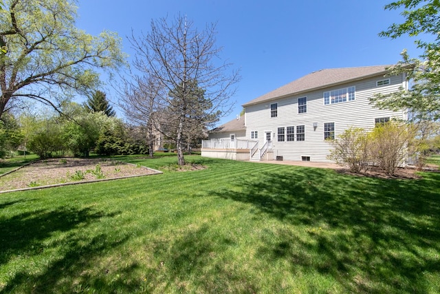 6433 Davidson Ct, Gurnee, IL 60031 - back of property featuring a deck and a lawn
