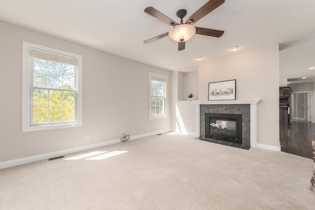 6433 Davidson Ct, Gurnee, IL 60031 - unfurnished living room featuring baseboards, a tiled fireplace, dark carpet, a ceiling fan, and recessed lighting