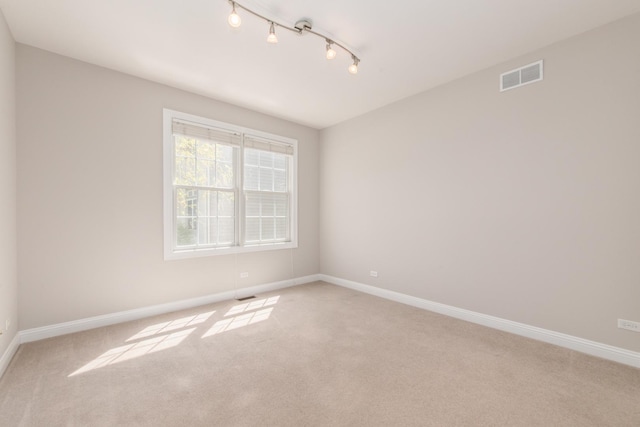6433 Davidson Ct, Gurnee, IL 60031 - carpeted empty room with baseboards