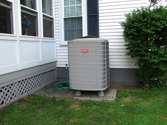 exterior details featuring cooling unit