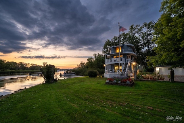 42136 N 7th Ave, Antioch, IL 60002 - yard at dusk featuring a balcony and a lawn