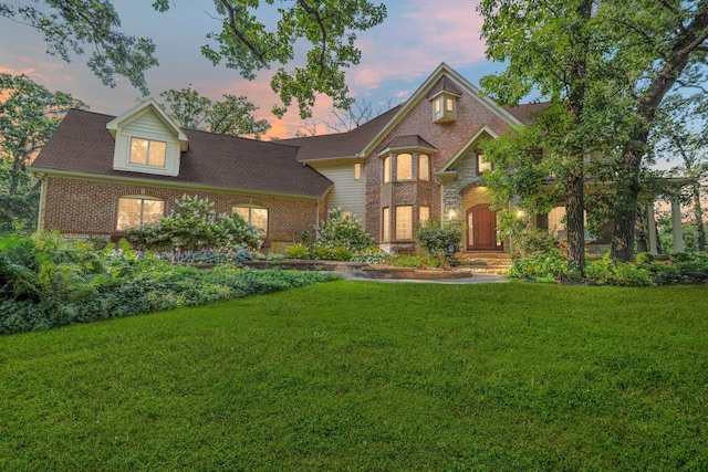 41W050 Stoneridge Ln, Elgin, IL 60124 - view of front facade featuring a yard and brick siding