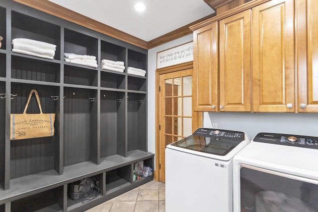41W050 Stoneridge Ln, Elgin, IL 60124 - washroom featuring cabinet space, light tile patterned floors, and washer and dryer