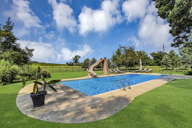 41W050 Stoneridge Ln, Elgin, IL 60124 - view of swimming pool featuring a yard, a fenced in pool, a water slide, and fence
