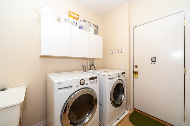 716 Samson Way, Northbrook, IL 60062 - washroom featuring cabinet space, washer and clothes dryer, and light tile patterned floors
