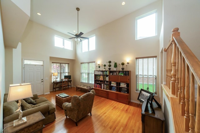 716 Samson Way, Northbrook, IL 60062 - living room featuring a high ceiling, ceiling fan, light wood-style floors, and recessed lighting
