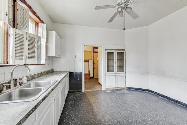 7658 S Laflin St, Chicago, IL 60620 - kitchen with white cabinetry, a sink, backsplash, and ceiling fan