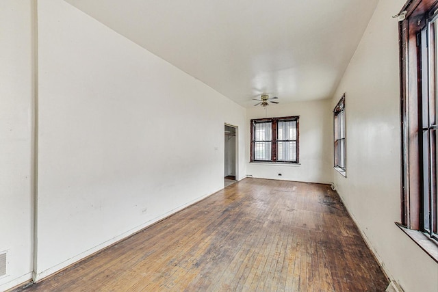 7658 S Laflin St, Chicago, IL 60620 - unfurnished room with wood-type flooring, visible vents, and ceiling fan