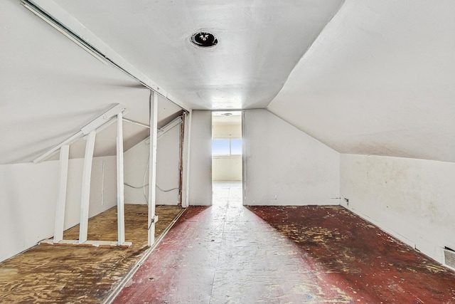7658 S Laflin St, Chicago, IL 60620 - additional living space with visible vents and vaulted ceiling