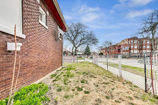 7658 S Laflin St, Chicago, IL 60620 - view of yard featuring fence and a residential view