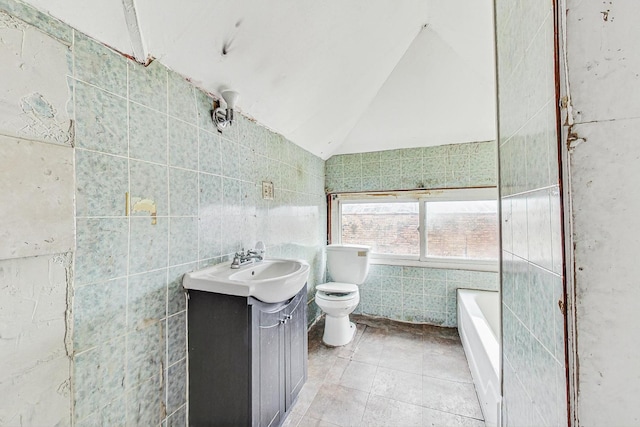 7658 S Laflin St, Chicago, IL 60620 - full bath with vanity, toilet, lofted ceiling, tile walls, and a bathtub