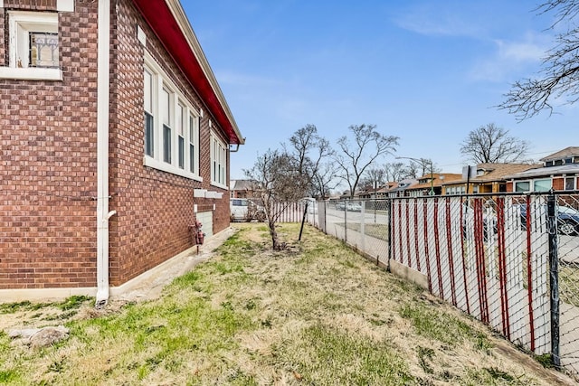 7658 S Laflin St, Chicago, IL 60620 - view of yard featuring a fenced backyard and a residential view