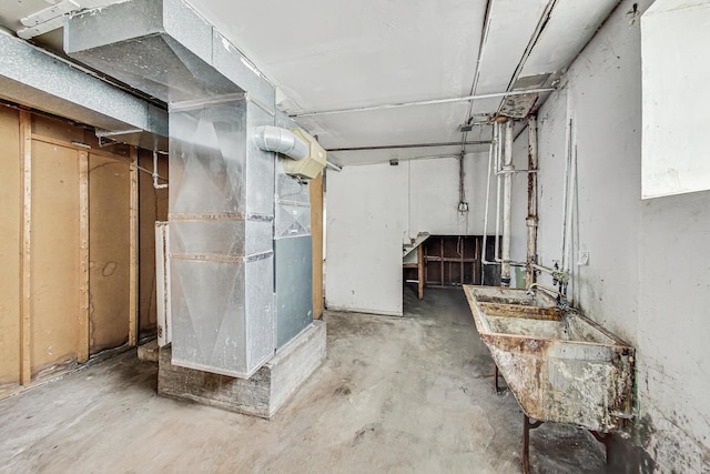 7658 S Laflin St, Chicago, IL 60620 - basement featuring a sink and heating unit