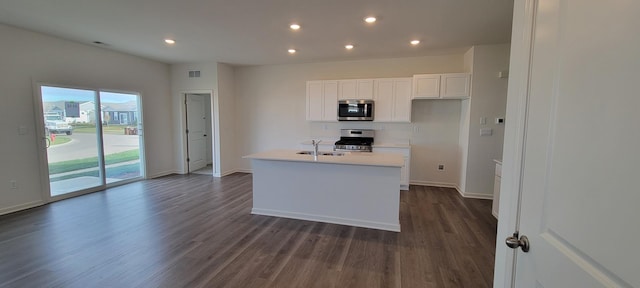 6457 Juniper Dr, Wonder Lake, IL 60097 - kitchen with visible vents, white cabinets, dark wood-style flooring, recessed lighting, and stainless steel appliances