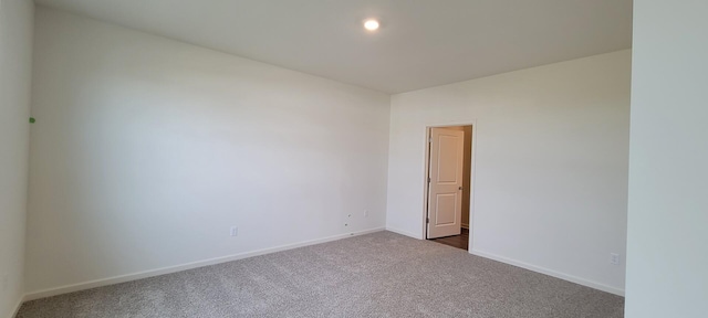6457 Juniper Dr, Wonder Lake, IL 60097 - unfurnished room featuring dark carpet, baseboards, and recessed lighting