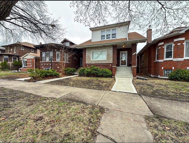 view of front of home with brick siding