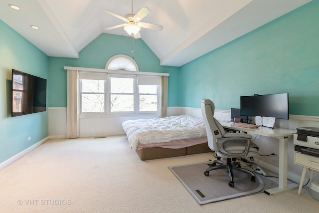 carpeted bedroom featuring ceiling fan and vaulted ceiling