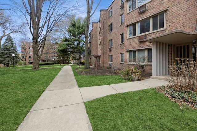 surrounding community with a yard