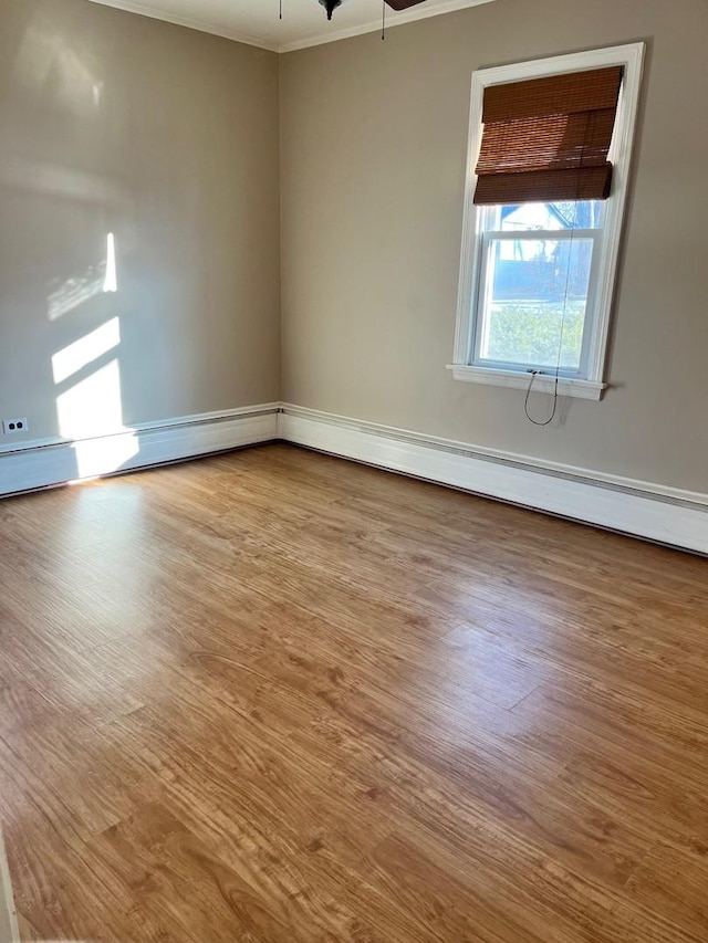 158 N Pershing Ave, Mundelein, IL 60060 - spare room with ornamental molding, wood finished floors, and a ceiling fan