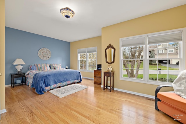 803 Pleasant Dr, Fox River Grove, IL 60021 - bedroom with baseboards and wood finished floors