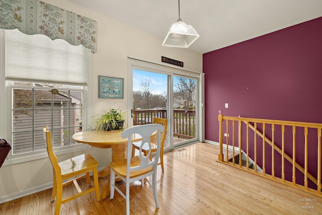 803 Pleasant Dr, Fox River Grove, IL 60021 - dining area with baseboards and wood finished floors