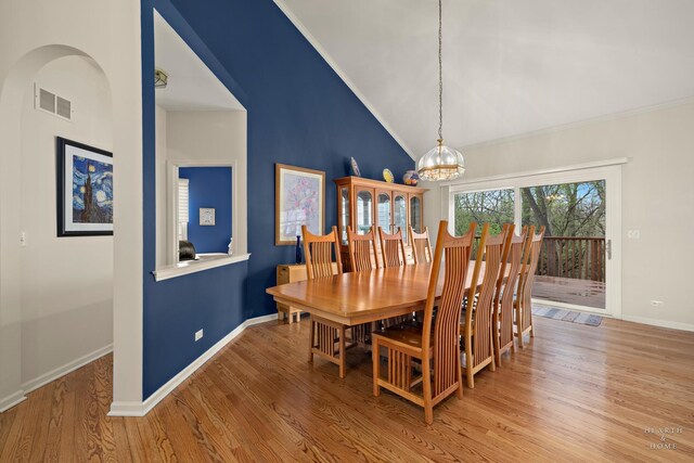 803 Pleasant Dr, Fox River Grove, IL 60021 - dining space featuring visible vents, wood finished floors, a notable chandelier, and baseboards