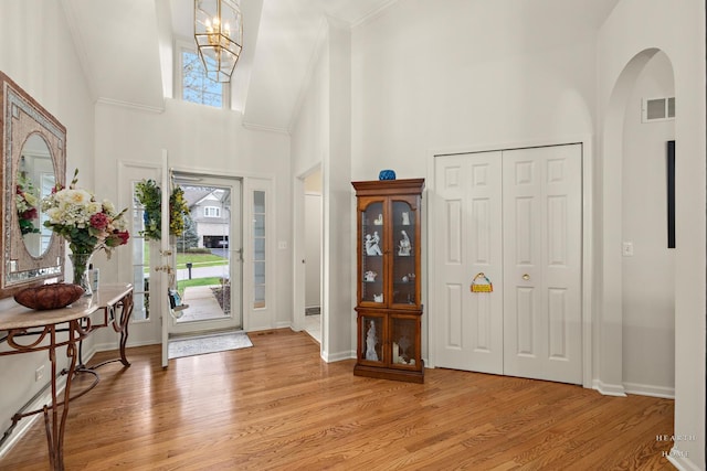 803 Pleasant Dr, Fox River Grove, IL 60021 - entryway with light wood finished floors, a high ceiling, visible vents, and a wealth of natural light