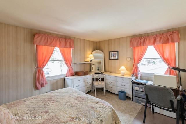 bedroom with an office area
