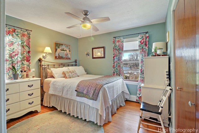 36603 N Iola Ave, Ingleside, IL 60041 - bedroom featuring ceiling fan and wood finished floors