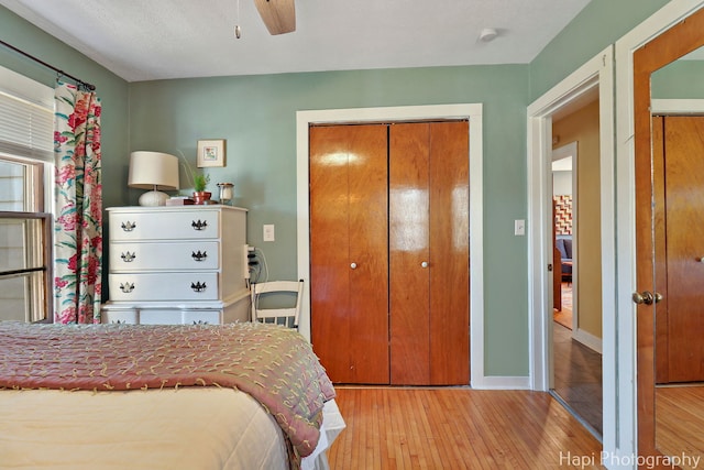 36603 N Iola Ave, Ingleside, IL 60041 - bedroom with hardwood / wood-style floors, baseboards, a closet, and ceiling fan