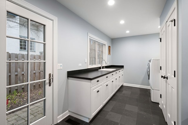 195 Lakeside Pl, Highland Park, IL 60035 - kitchen featuring visible vents, recessed lighting, a sink, dark countertops, and washer and clothes dryer