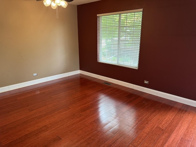 1314 Sandhurst Ln Unit 1314, South Elgin, IL 60177 - empty room featuring ceiling fan, baseboards, and wood finished floors