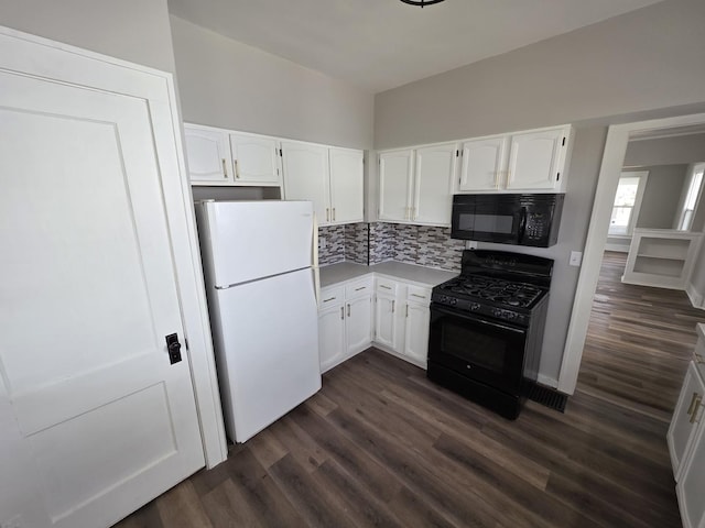 kitchen with white cabinets, backsplash, and black appliances