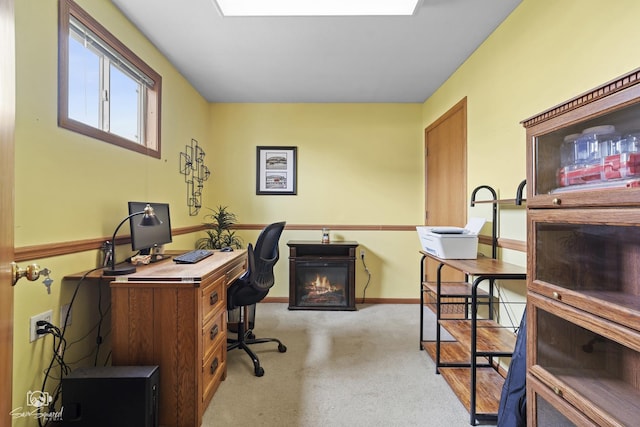 office with carpet flooring and baseboards