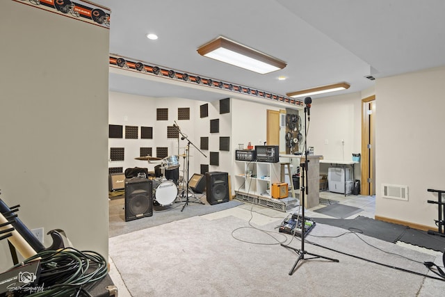 exercise room with visible vents, recessed lighting, and carpet flooring