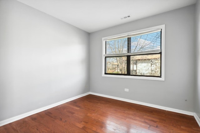 4130 192nd Ct Unit 222, Country Club Hills, IL 60478 - empty room with wood finished floors, baseboards, and visible vents