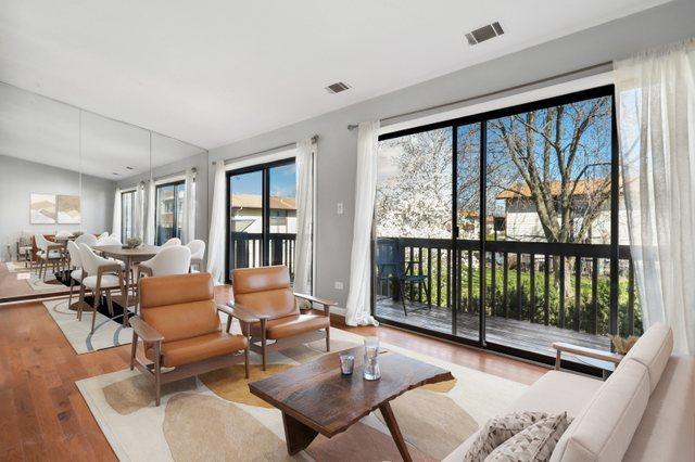 4130 192nd Ct Unit 222, Country Club Hills, IL 60478 - living area with visible vents and wood finished floors