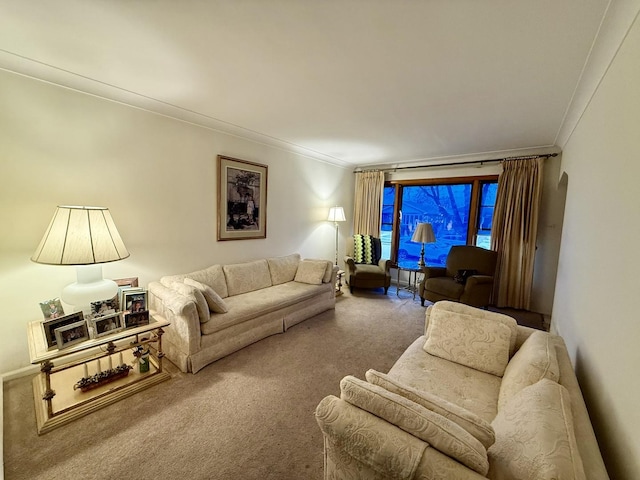 living room with carpet flooring and crown molding