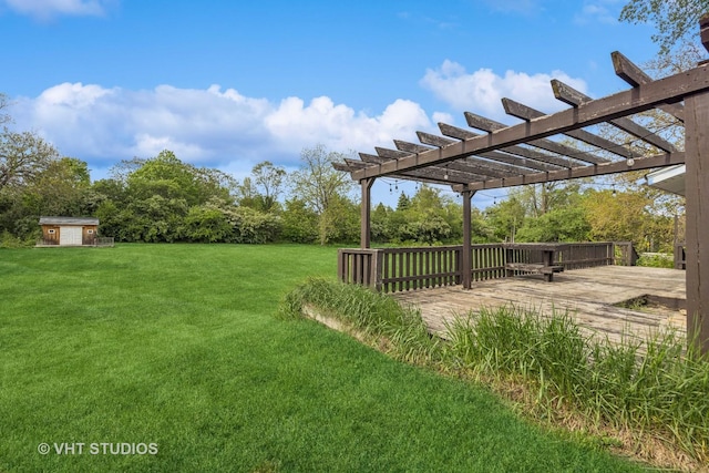 21W534 Bemis Rd, Glen Ellyn, IL 60137 - view of grassy yard with a pergola, a wooden deck, and an outbuilding