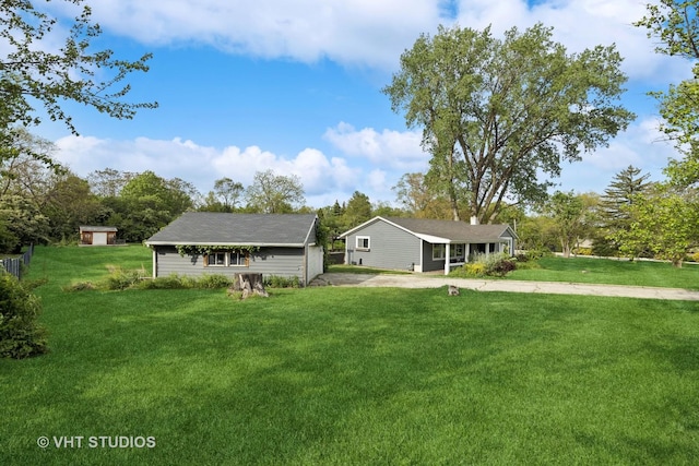 21W534 Bemis Rd, Glen Ellyn, IL 60137 - view of front of property with a front lawn and an outdoor structure