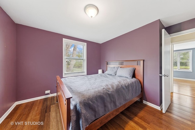 21W534 Bemis Rd, Glen Ellyn, IL 60137 - bedroom with multiple windows, wood finished floors, and baseboards