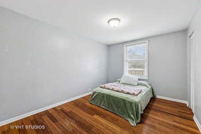 21W534 Bemis Rd, Glen Ellyn, IL 60137 - bedroom featuring wood finished floors, baseboards, and a closet