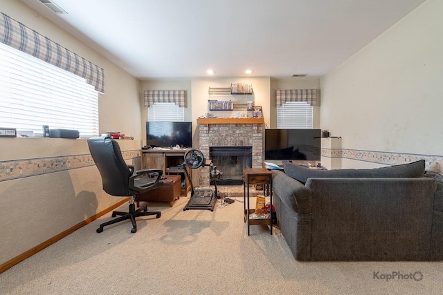 living room with carpet flooring, a brick fireplace, visible vents, and recessed lighting