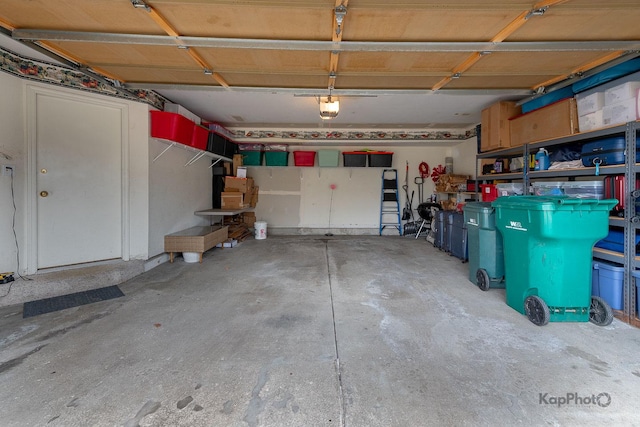 garage featuring a garage door opener