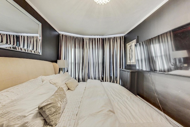 bedroom featuring ornamental molding