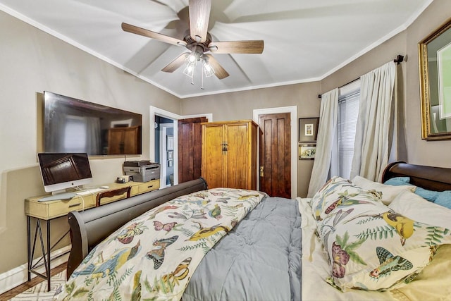 bedroom with crown molding and a ceiling fan