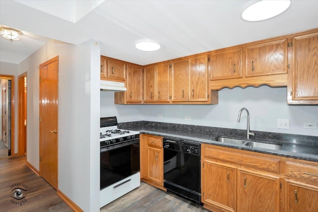 4920 134th Ct Unit 205, Crestwood, IL 60418 - kitchen with white gas range oven, black dishwasher, a sink, under cabinet range hood, and wood finished floors