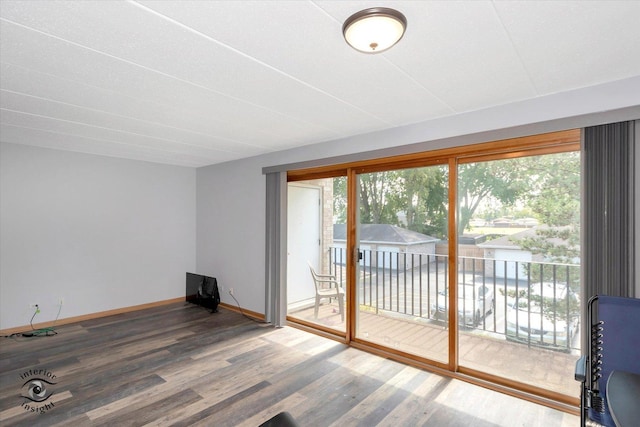 4920 134th Ct Unit 205, Crestwood, IL 60418 - empty room featuring wood finished floors, healthy amount of natural light, and baseboards