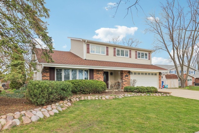 traditional-style home with concrete driveway, roof with shingles, a front lawn, brick siding, and a garage